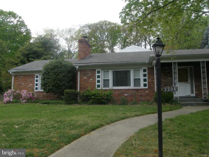 3306 Russell Road Alexandria, VA 22305 - Photo 17 of 21 a view of a house with a yard and plants