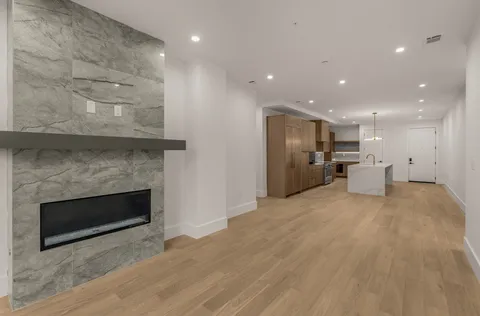 a large bathroom with a double vanity sink and a mirror