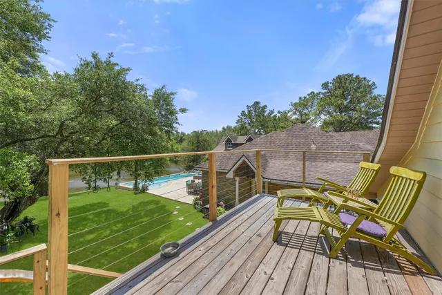 a view of a wooden deck with a bench