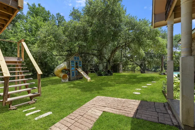 a view of a garden with a slide