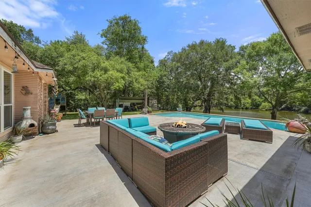 a view of outdoor space swimming pool and furniture