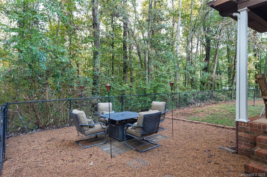 345 Whiteside Road Clover, SC 29710 - Photo 12 of 46 a view of a lounge chair in the middle of a yard
