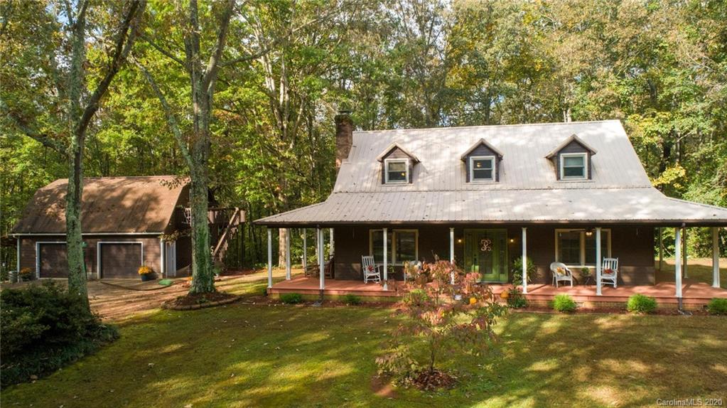 345 Whiteside Road Clover, SC 29710 - Photo 3 of 46 a front view of a house with swimming pool