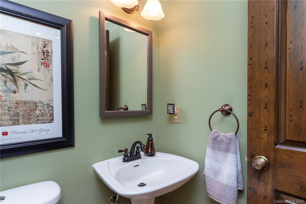 345 Whiteside Road Clover, SC 29710 - Photo 30 of 46 a bathroom with a sink mirror and toilet
