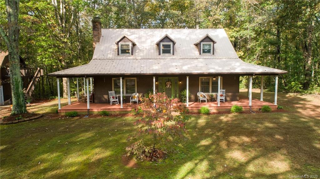345 Whiteside Road Clover, SC 29710 - Photo 5 of 46 a front view of a house with swimming pool