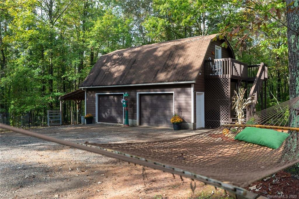 345 Whiteside Road Clover, SC 29710 - Photo 10 of 46 a front view of a house with a garden