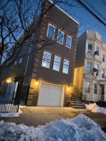 a view of a building with a street