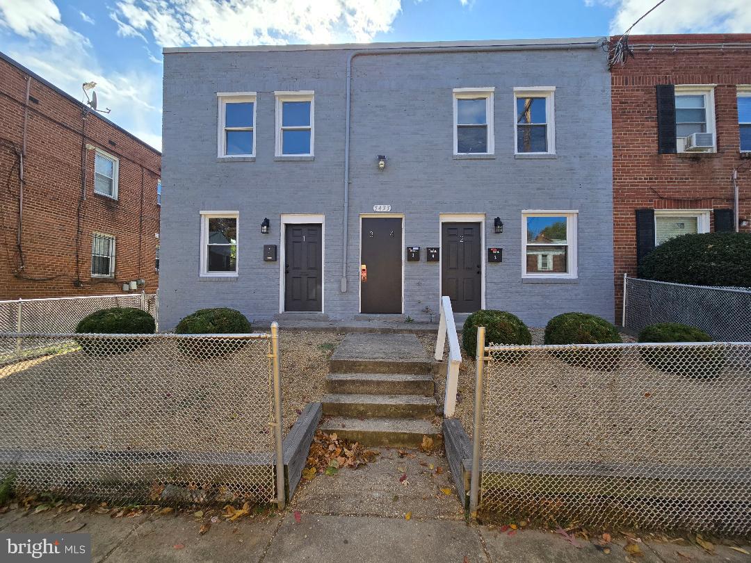 5433 C Street Southeast, Unit 2 Washington, DC 20019 - Photo 1 of 7 a front view of a house with outdoor space