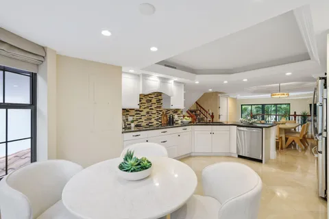 a view of a hallway with a window