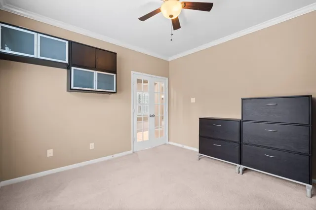 a view of an empty room with cabinet