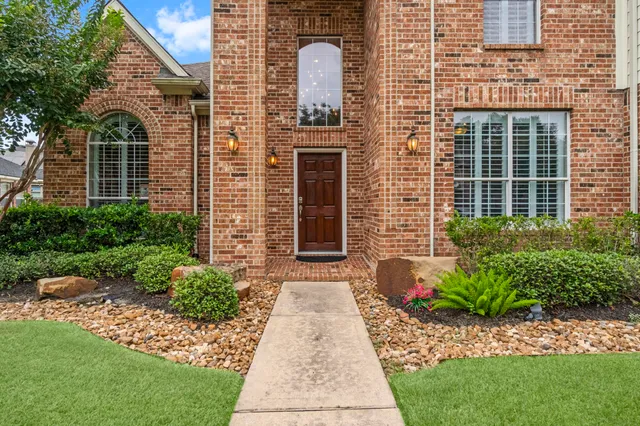 a front view of a house having yard