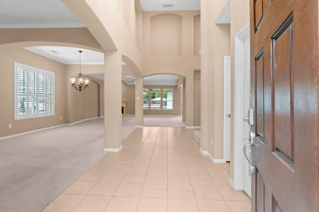 a view of an entryway with a livingroom