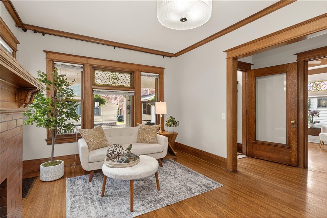 34 Erion Crescent Rochester, NY 14607 - Photo 9 of 49 living room and view to front door and parlor/den/
