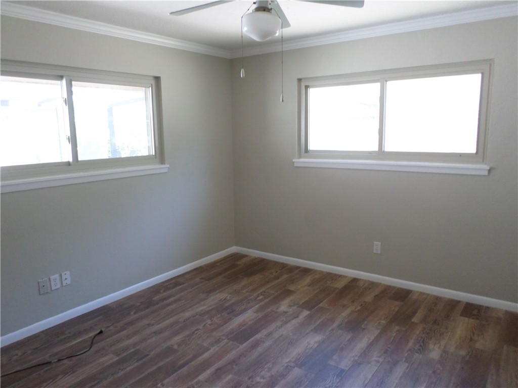 136 Granby Place Portland, TX 78374 - Photo 10 of 16 an empty room with a window