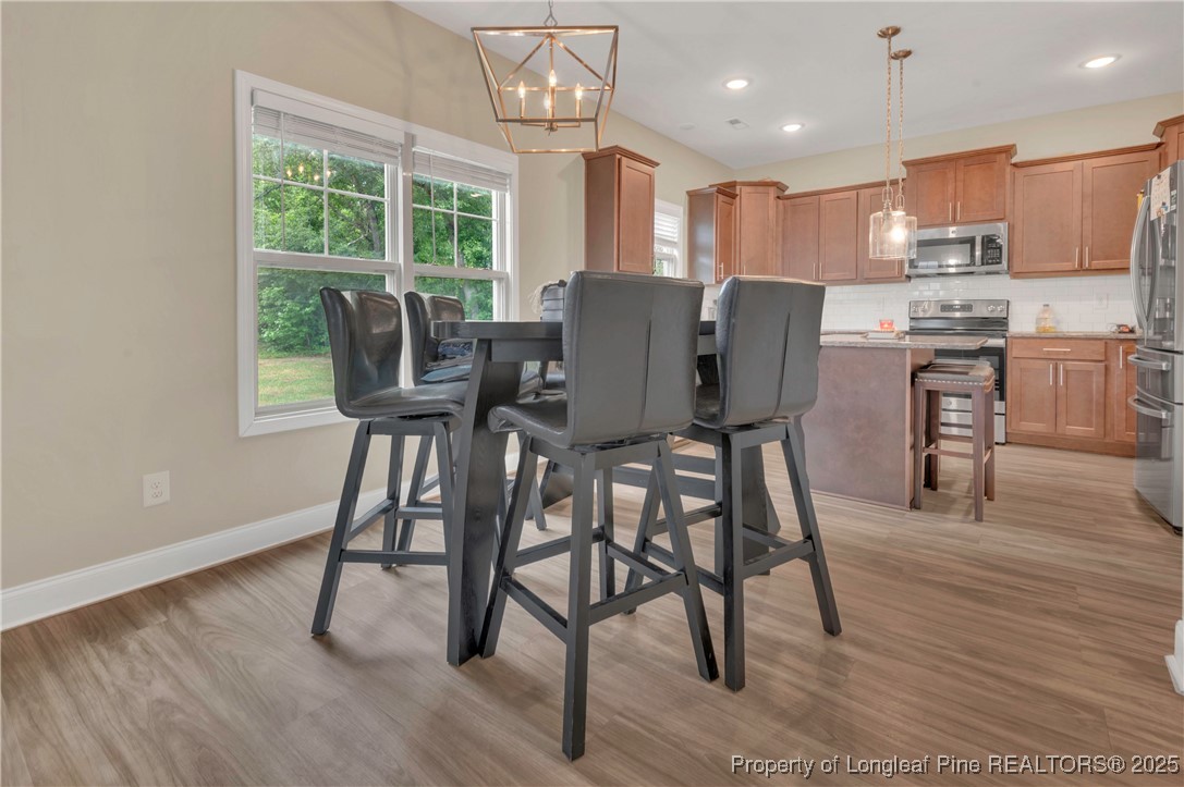 5145 Maxwell Road Stedman, NC 28391 - Photo 8 of 35 a view of a dining room with furniture window and outside view