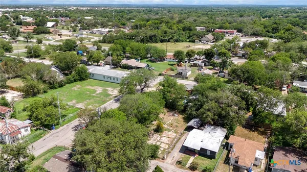 an aerial view of residential house with outdoor space