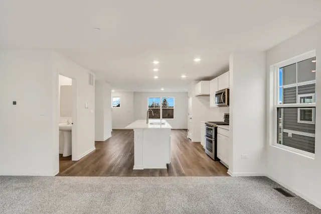 wooden floor in kitchen and dining room with wooden floor