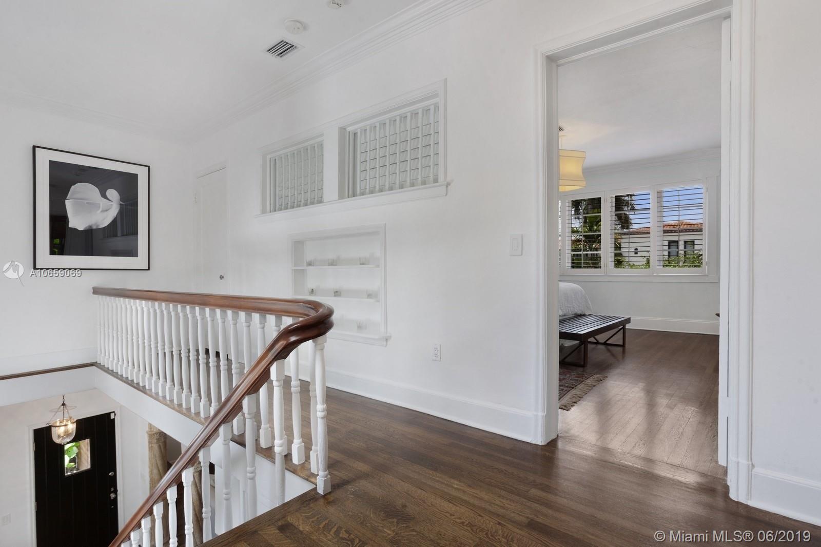 2355 North Bay Road Miami Beach, FL 33140 - Photo 12 of 24 staircase landing/second bedroom upstairs