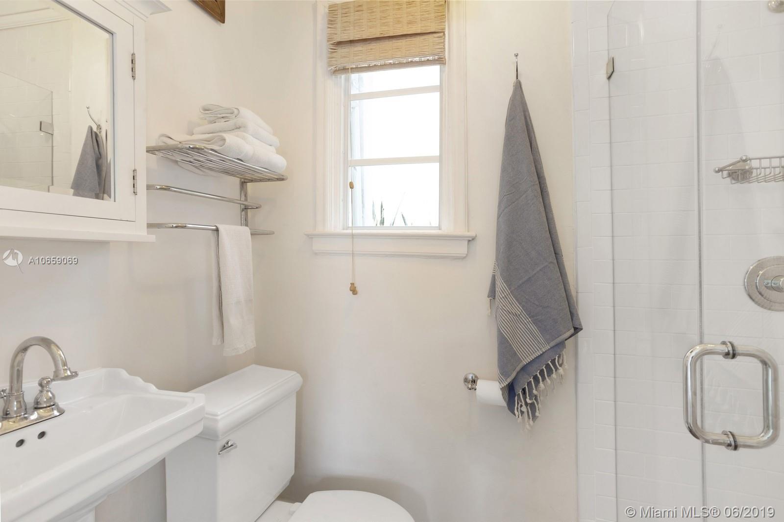 2355 North Bay Road Miami Beach, FL 33140 - Photo 20 of 24 downstairs bathroom for fourth bedroom