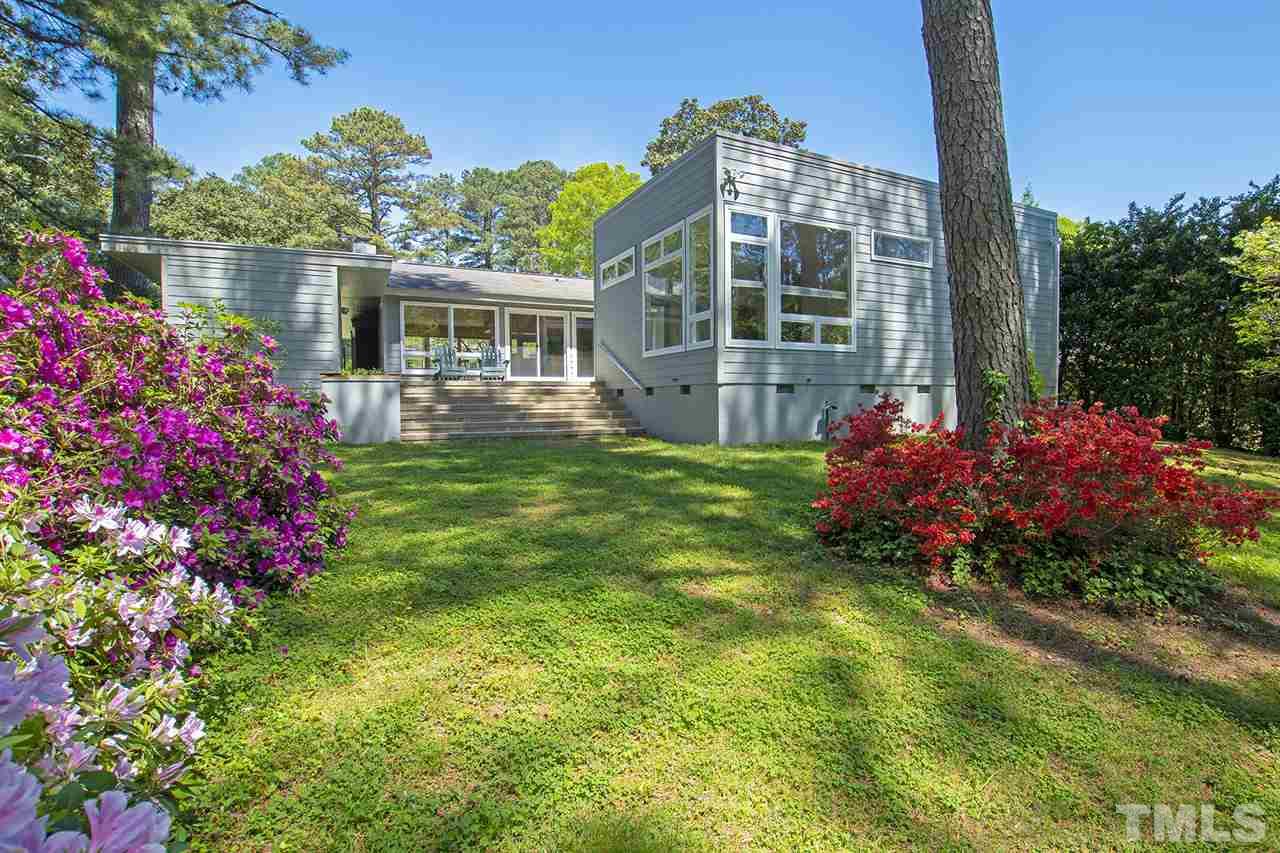 3405 Cherry Lane Raleigh, NC 27607 - Photo 15 of 18 a front view of house with yard and trees