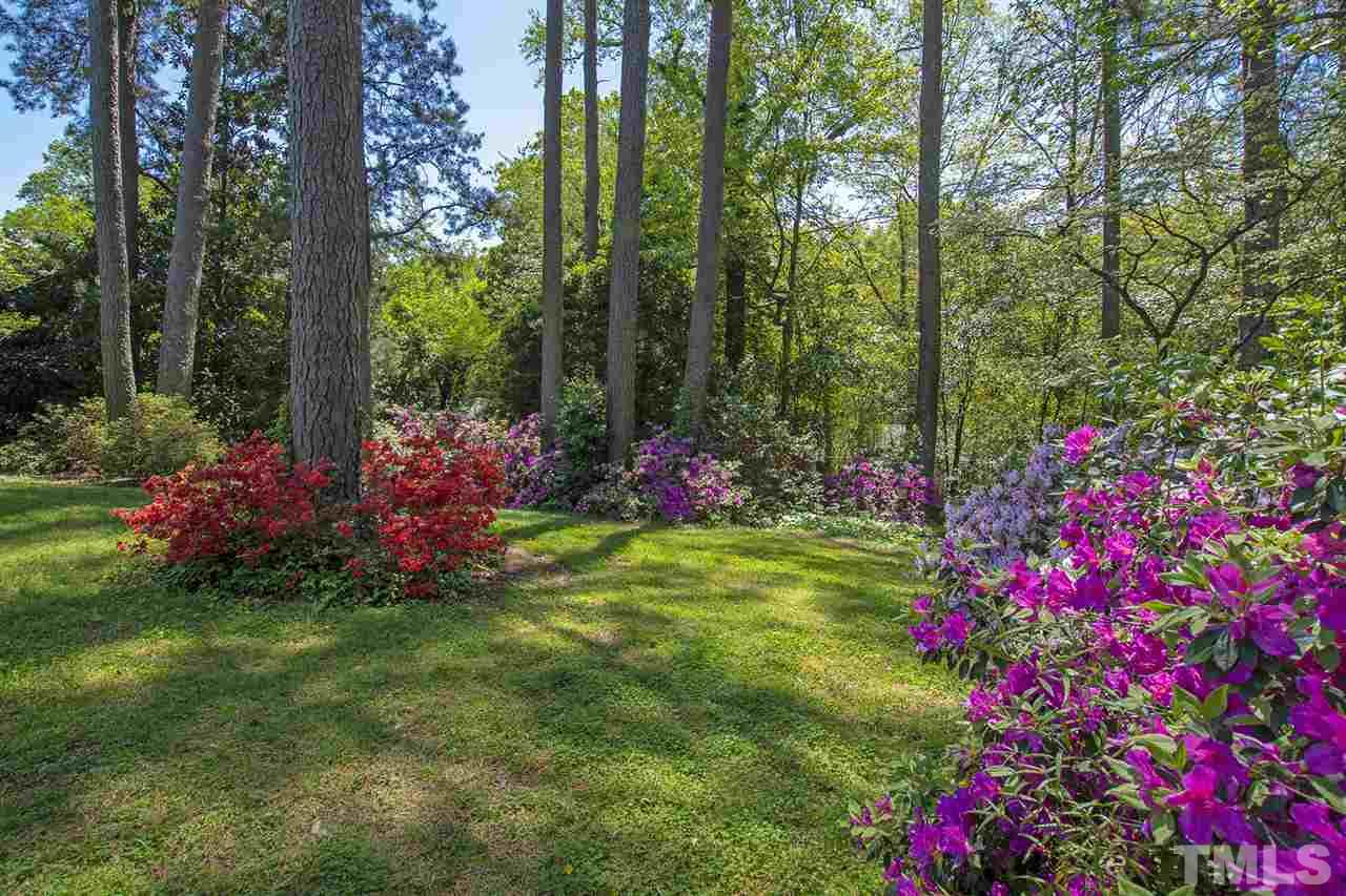 3405 Cherry Lane Raleigh, NC 27607 - Photo 17 of 18 a view of a flower garden in a backyard