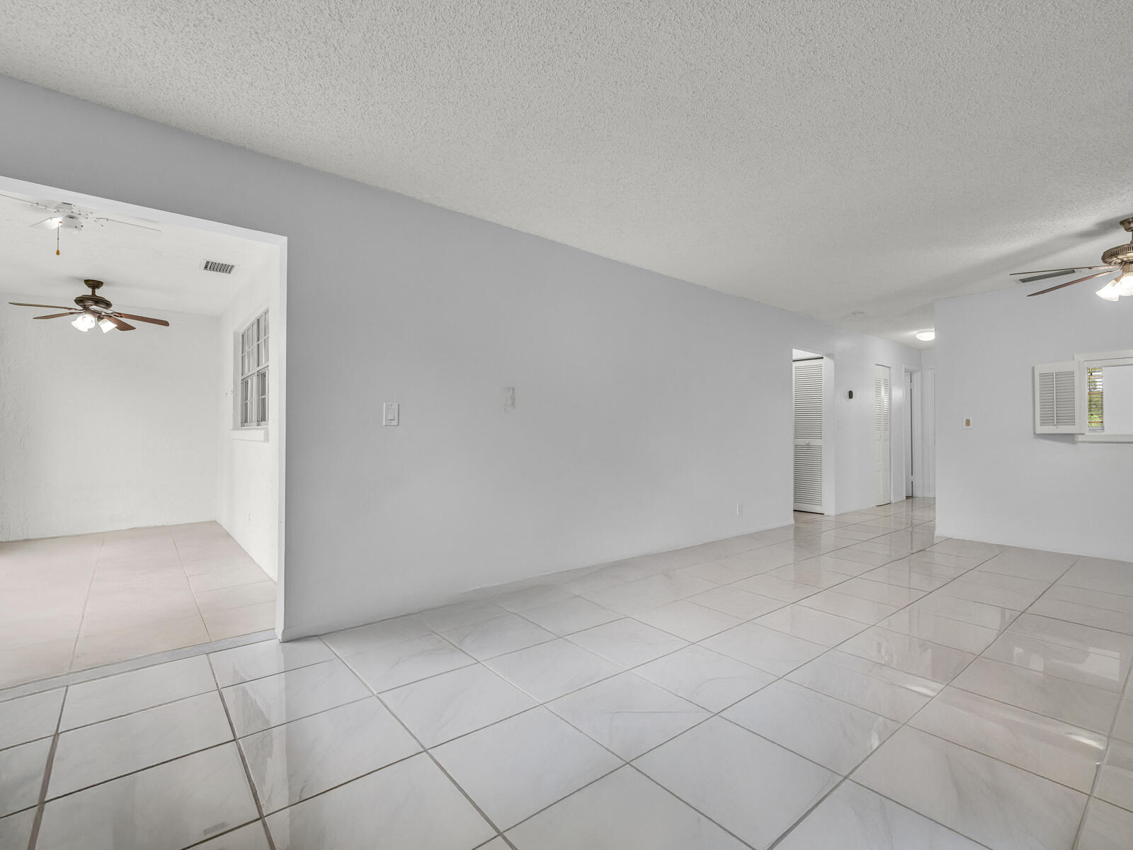 3001 Linton Boulevard, Unit 206C Delray Beach, FL 33445 - Photo 11 of 27 a view of an empty room