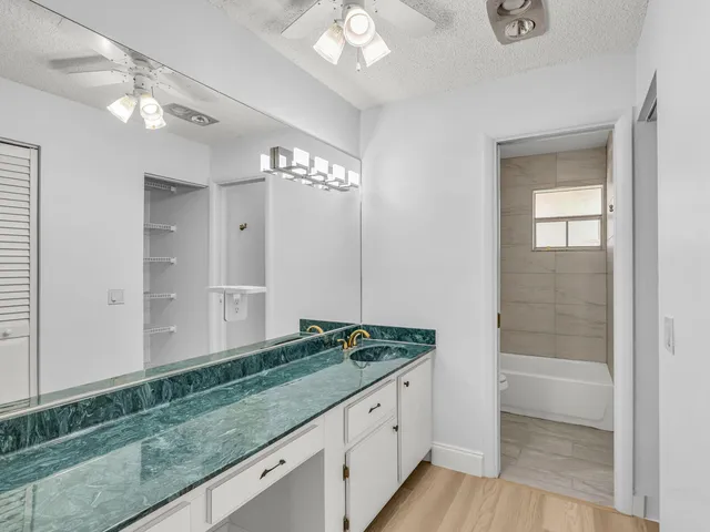 a view of bathroom with dual sinks