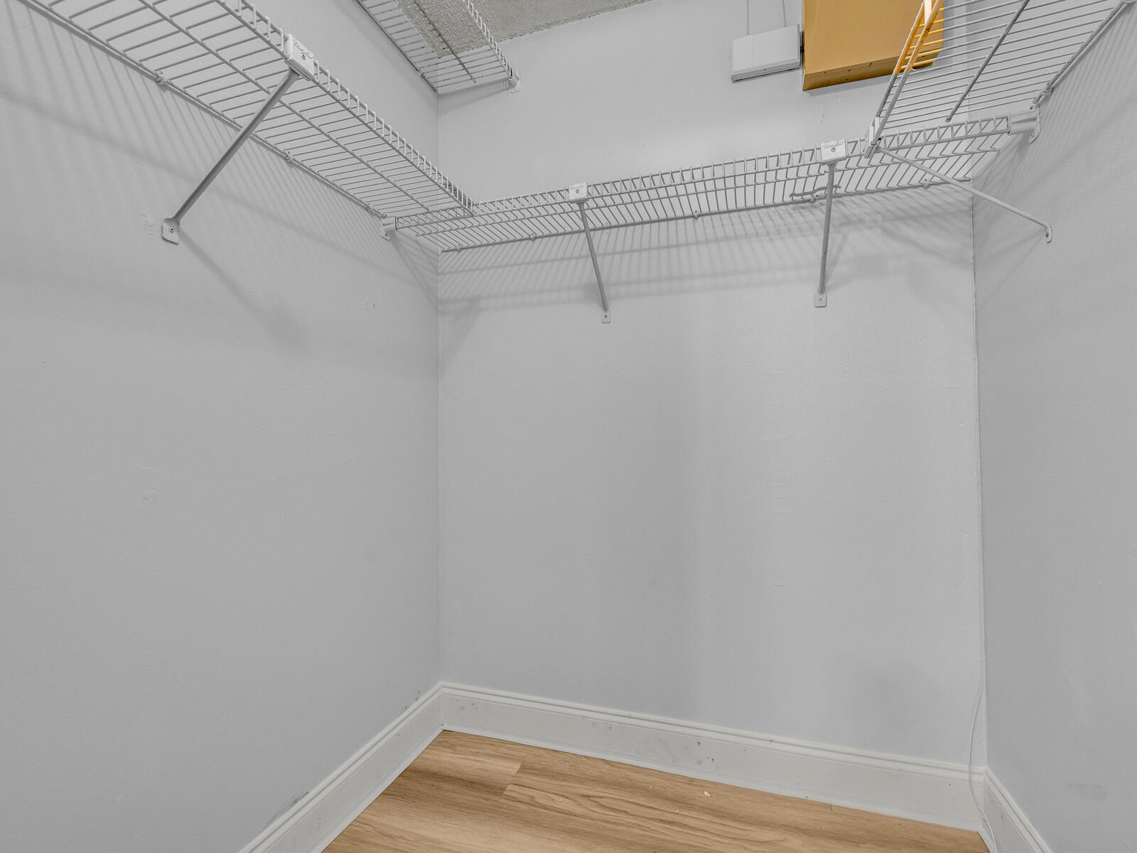 3001 Linton Boulevard, Unit 206C Delray Beach, FL 33445 - Photo 19 of 27 a view of a room with racks on the wall