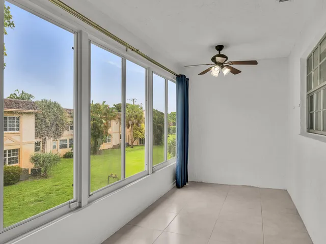 a view of room with a large window