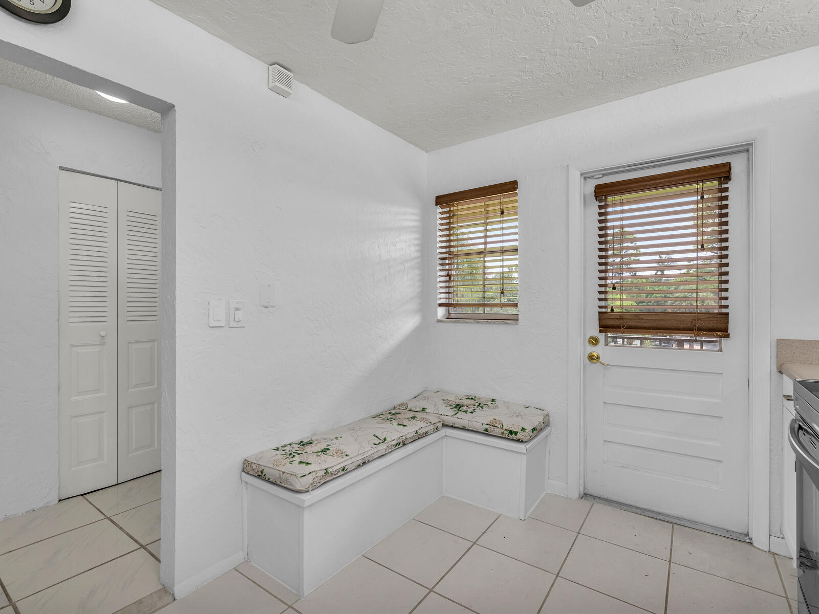 3001 Linton Boulevard, Unit 206C Delray Beach, FL 33445 - Photo 8 of 27 a view of an empty room with a window