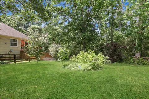 a view of a backyard with a garden