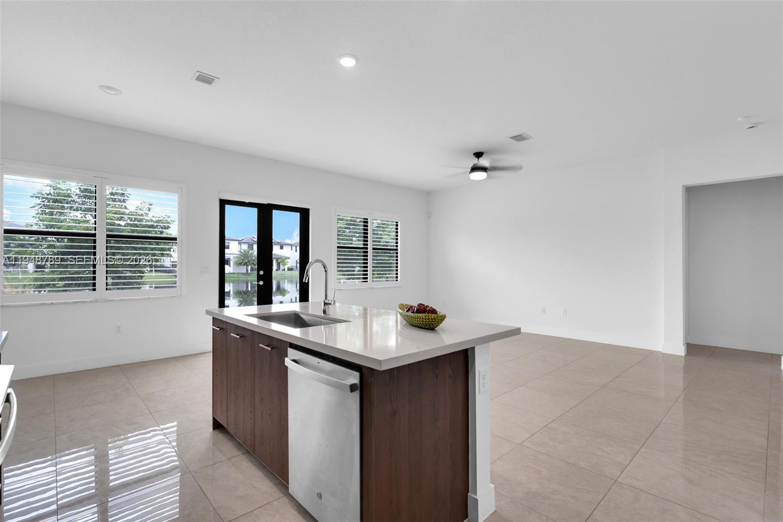 4538 Southwest 173rd Avenue Miramar, FL 33029 - Photo 15 of 48 a room with granite countertop a sink and a window