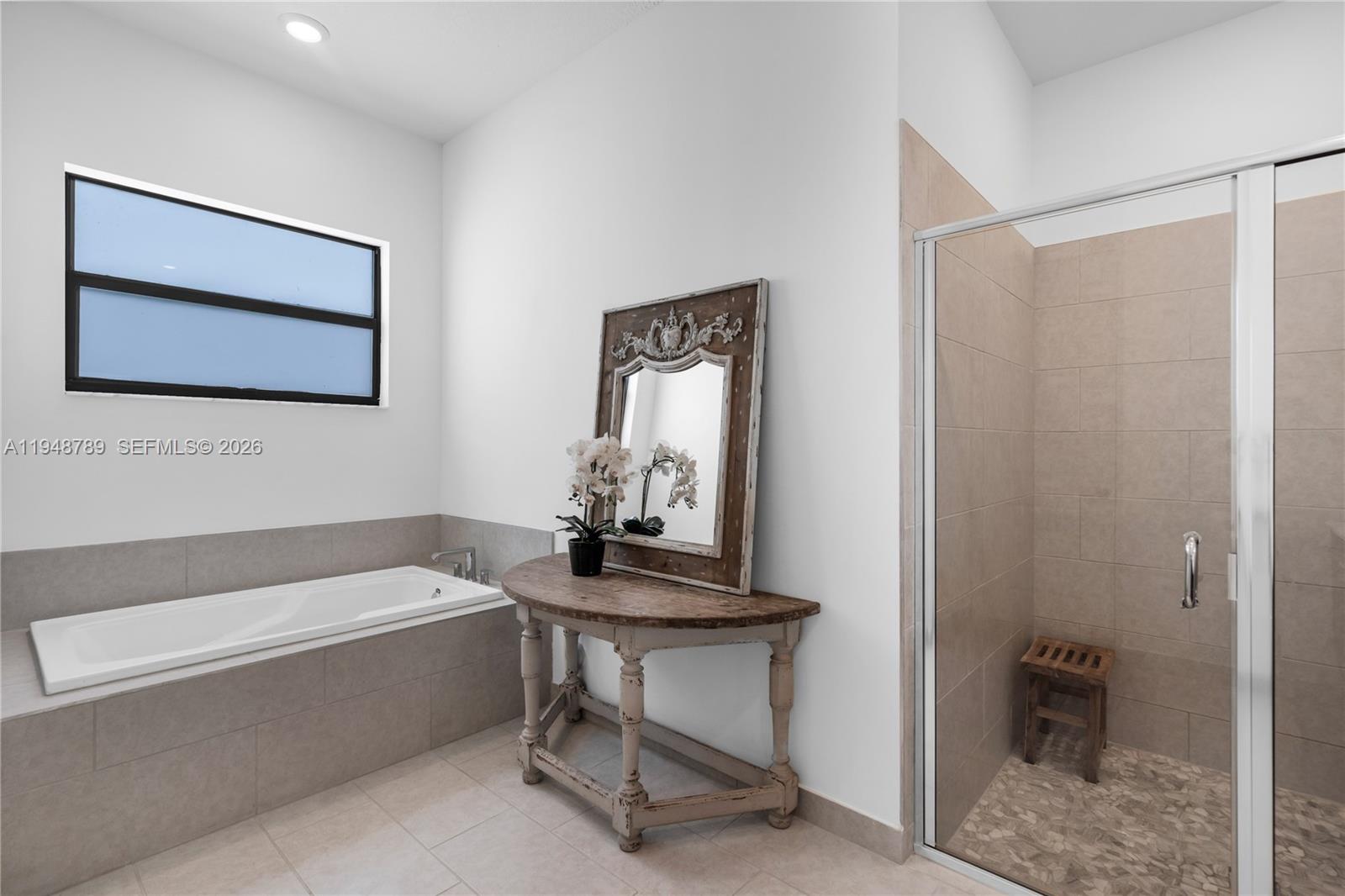 4538 Southwest 173rd Avenue Miramar, FL 33029 - Photo 23 of 48 a bathroom with a bathtub and a sink