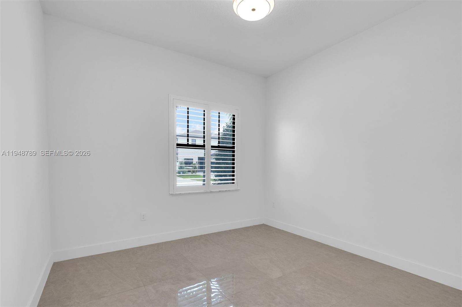 4538 Southwest 173rd Avenue Miramar, FL 33029 - Photo 30 of 48 an empty room with a window