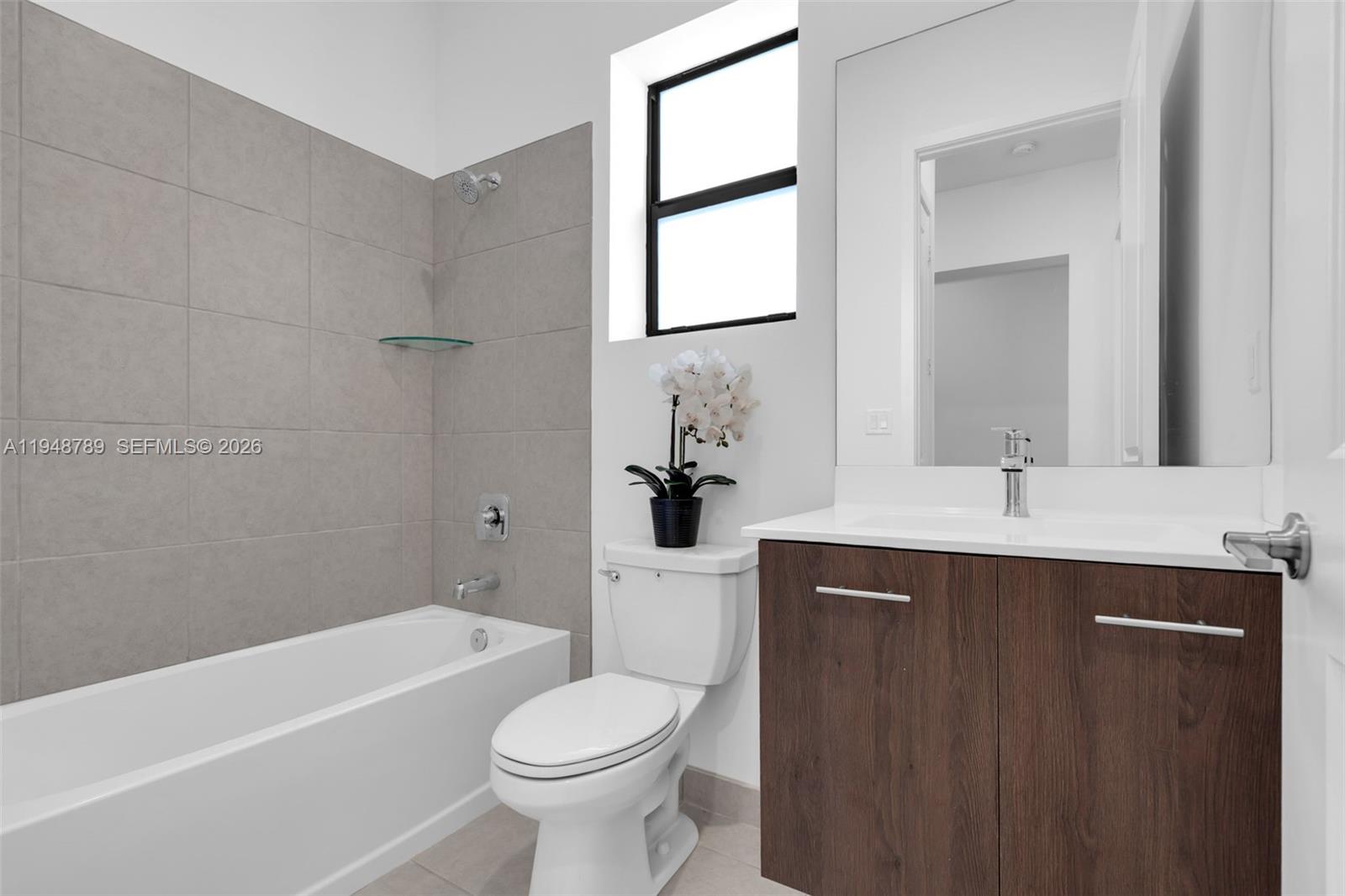 4538 Southwest 173rd Avenue Miramar, FL 33029 - Photo 33 of 48 a bathroom with a sink a toilet and a bathtub