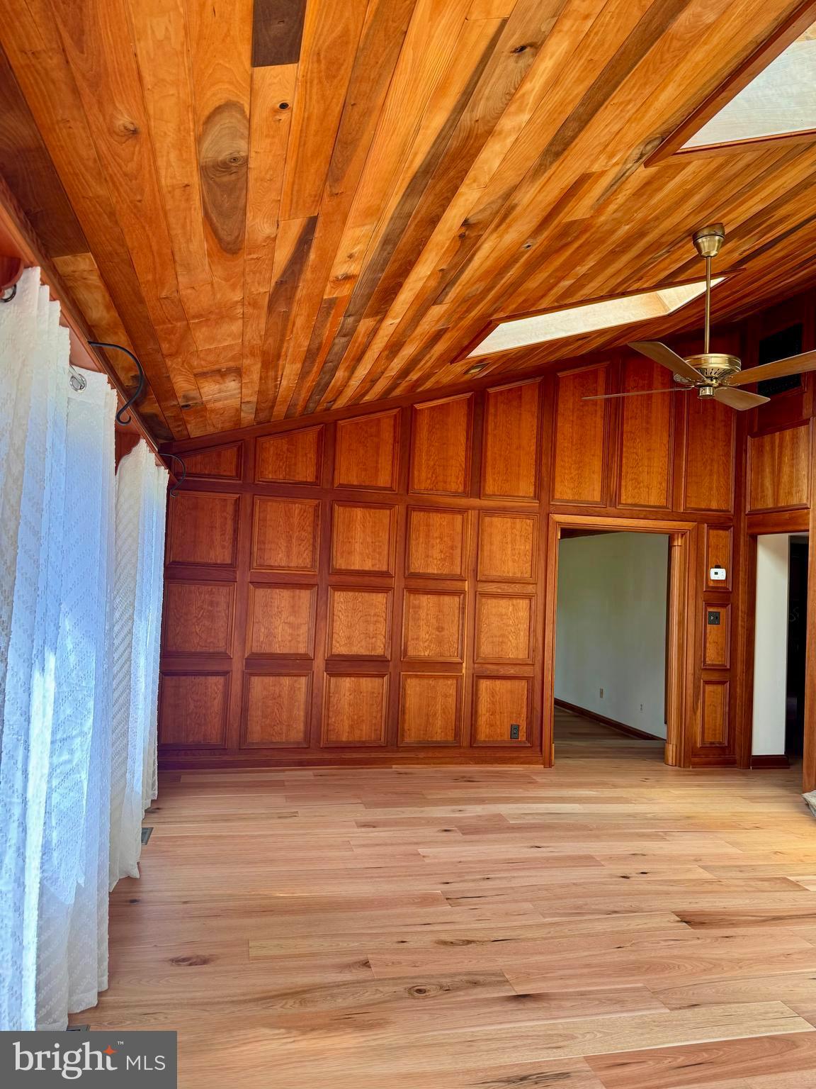 1080 Mt Airy Road Davidsonville, MD 21035 - Photo 12 of 64 a view of a room with wooden walls and stairs
