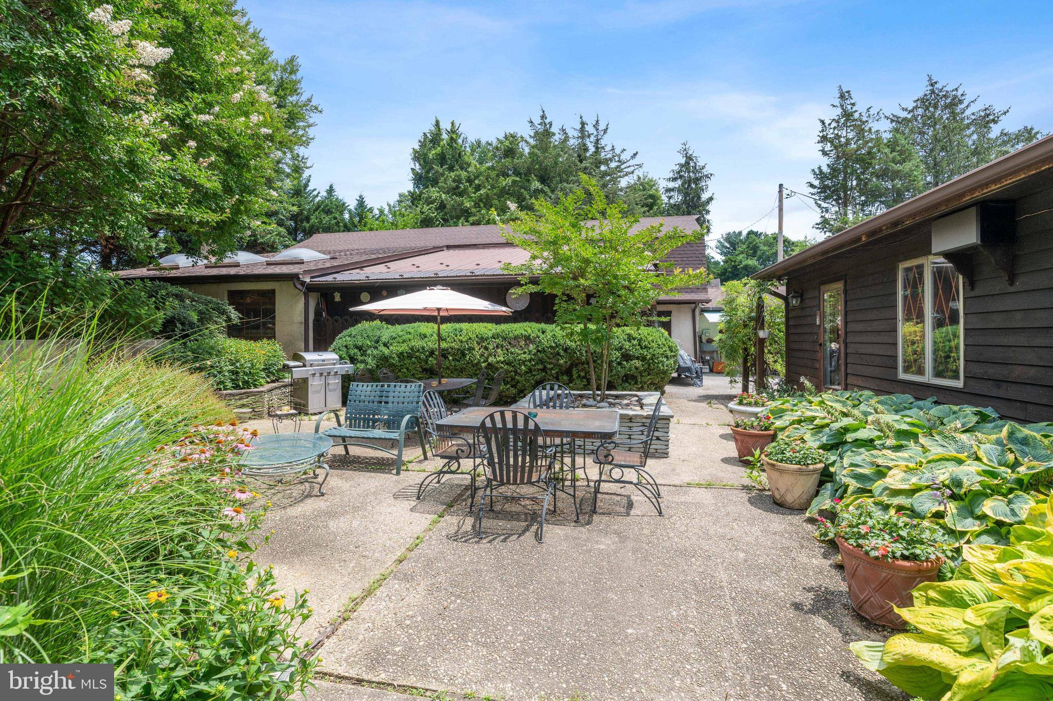 1080 Mt Airy Road Davidsonville, MD 21035 - Photo 38 of 64 a view of backyard with outdoor seating and green space