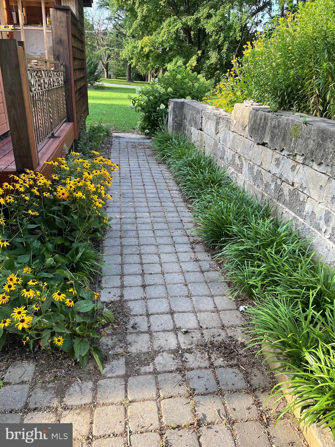 1080 Mt Airy Road Davidsonville, MD 21035 - Photo 43 of 64 a view of a pathway with a flower garden