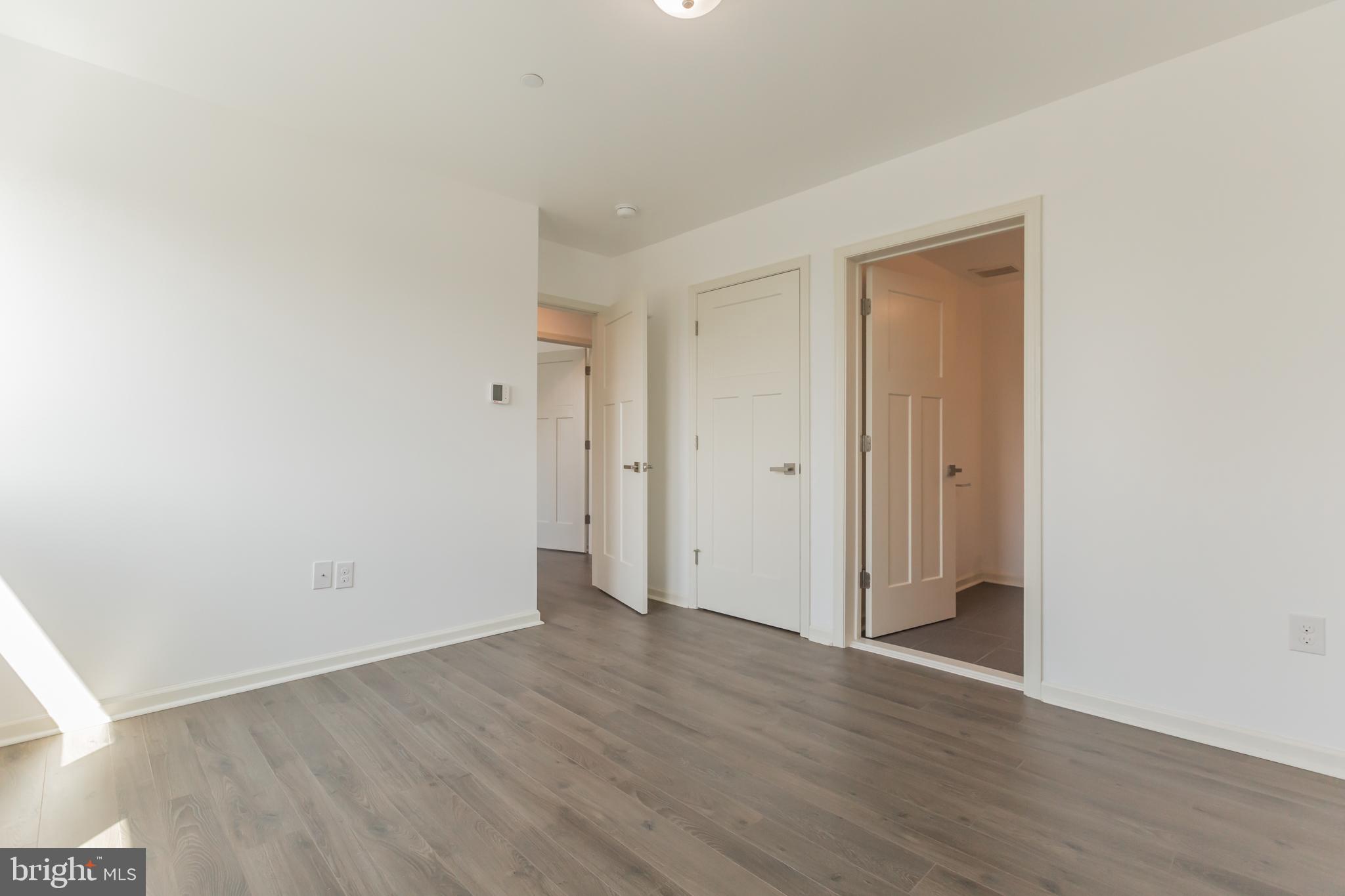 6778 Ridge Avenue, Unit 201 Philadelphia, PA 19128 - Photo 9 of 15 a view of a room with wooden floor