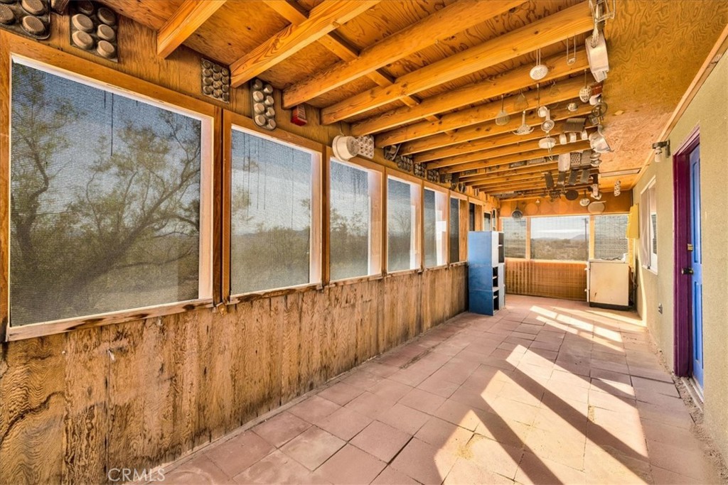 64720 Sonora Road Joshua Tree, CA 92252 - Photo 23 of 33 a view of a large room with wooden floor