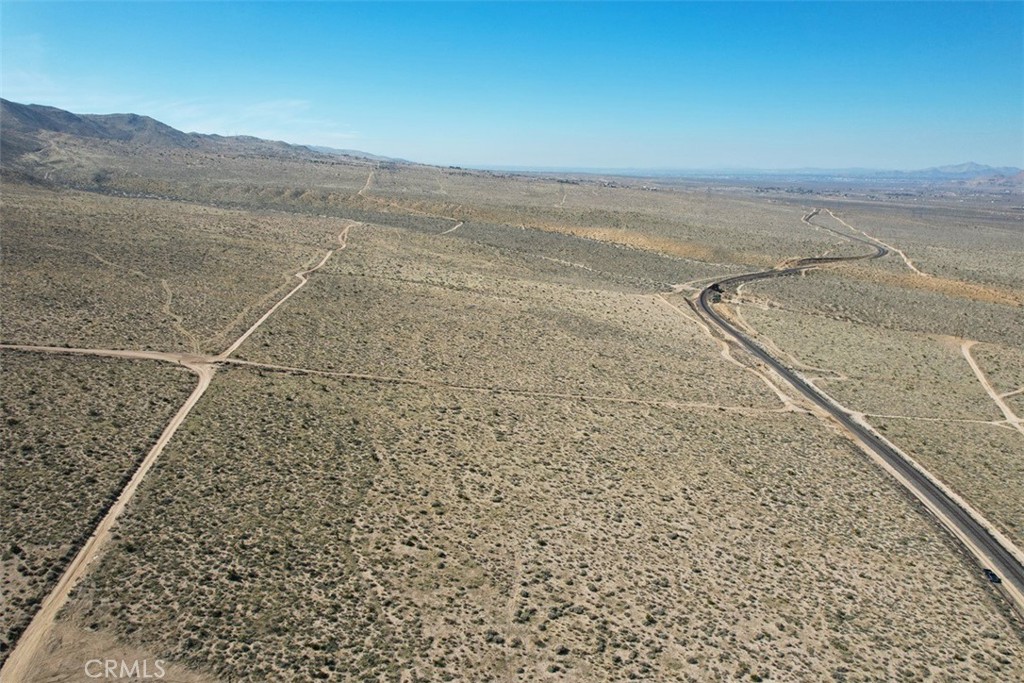 39 Santa Rosa Road Lucerne Valley, CA 92356 - Photo 12 of 18 a view of an ocean beach and mountain