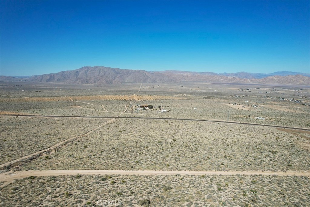 39 Santa Rosa Road Lucerne Valley, CA 92356 - Photo 15 of 18 a view of an ocean beach and mountain