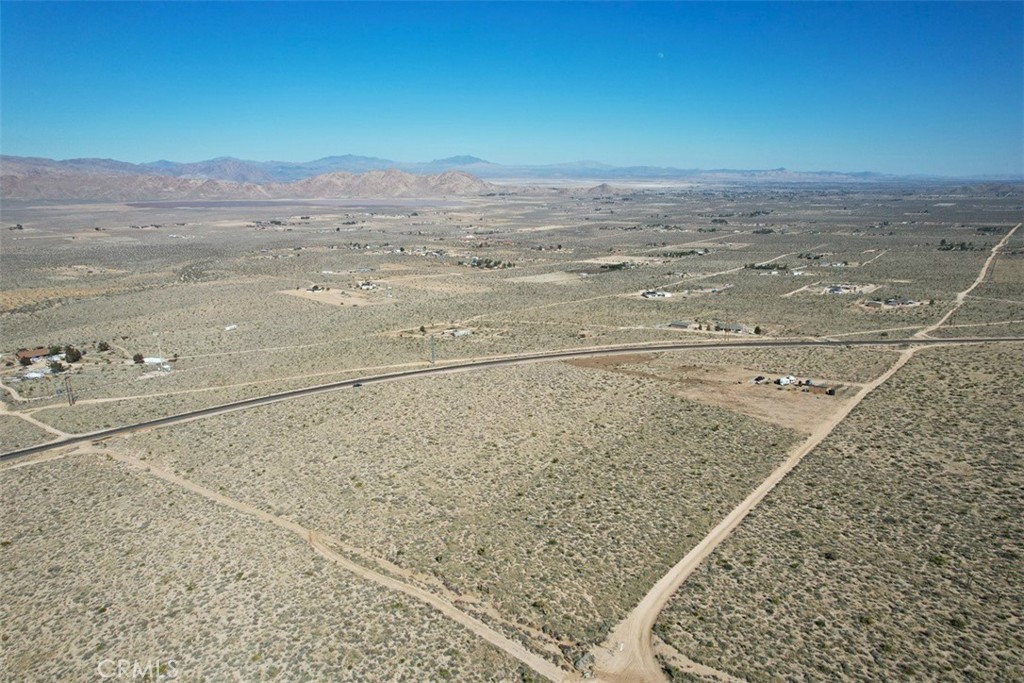 39 Santa Rosa Road Lucerne Valley, CA 92356 - Photo 10 of 18 a view of an ocean beach and mountain