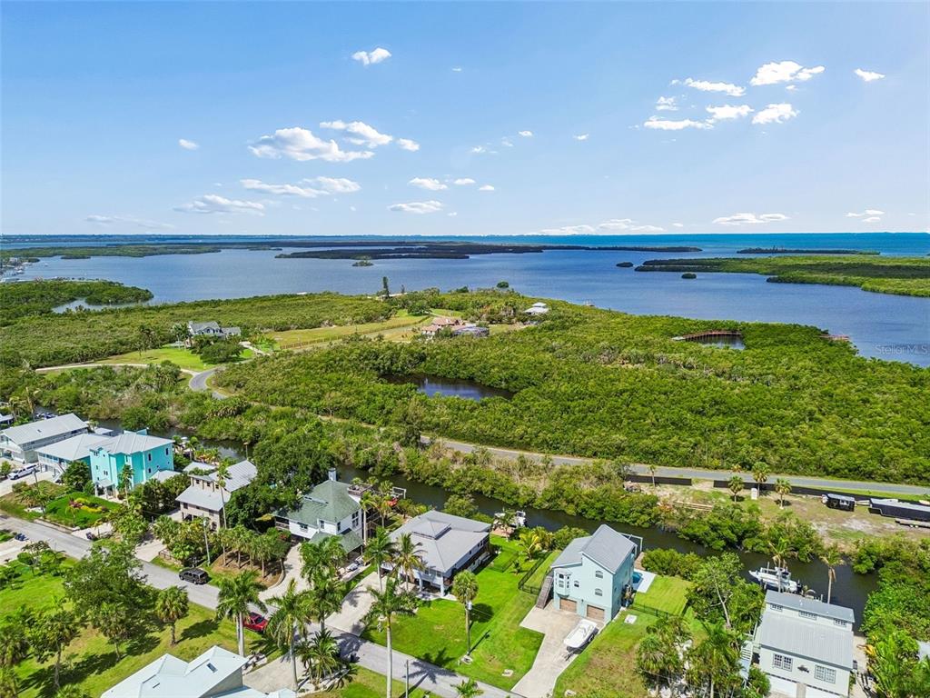 119 Burns Road Terra Ceia, FL 34250 - Photo 95 of 100 a view of an ocean and a building