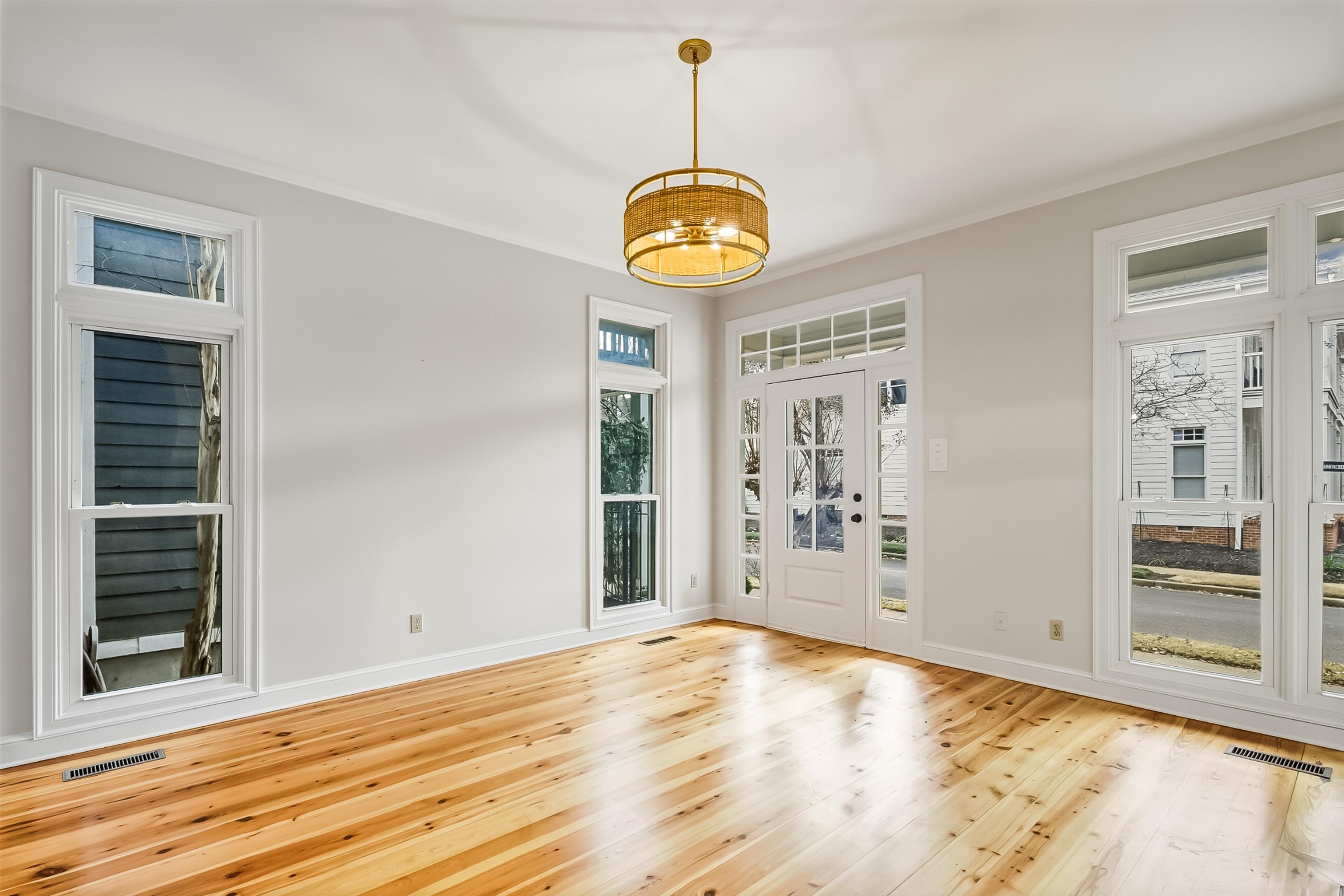 154 Harbor Ridge Lane North Memphis, TN 38103 - Photo 7 of 39 a view of a room with wooden floor and window