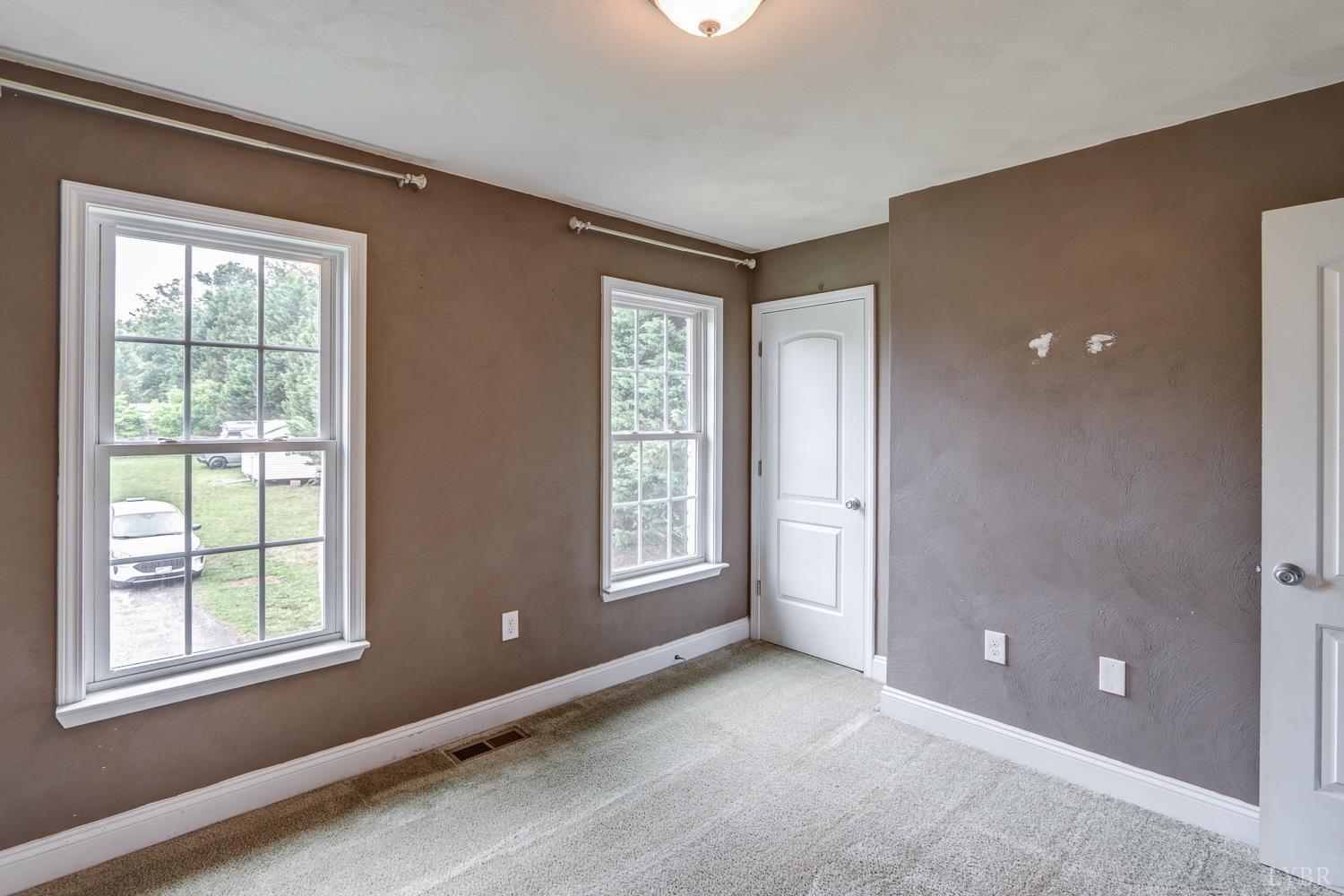 1057 Old Trail Road Forest, VA 24551 - Photo 39 of 49 a view of an empty room with a window