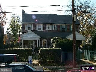 2304 Kenilworth Road Ardmore, PA 19003 - Photo 1 of 1 a front view of a house with garden