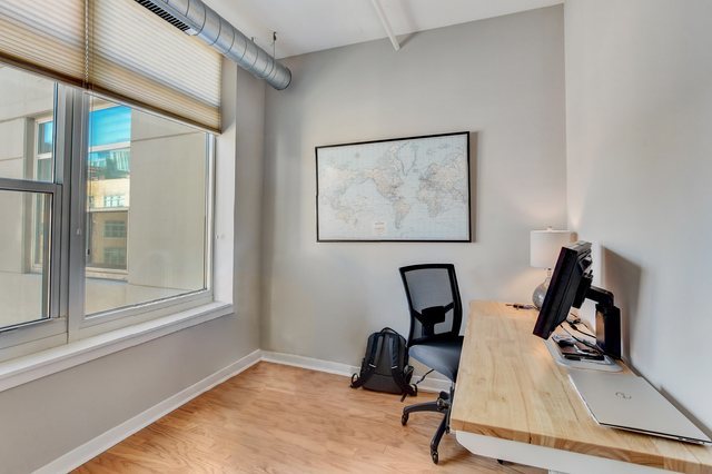 909 West Washington Boulevard, Unit 704 Chicago, IL 60607 - Photo 20 of 36 a view of workspace with furniture and windows