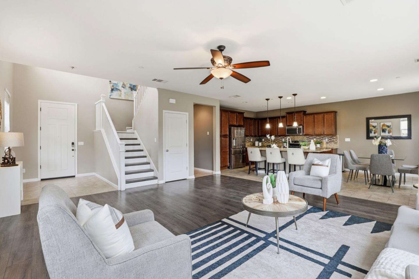 301 Promise Way Hollister, CA 95023 - Photo 15 of 22 a living room with furniture and a wooden floor
