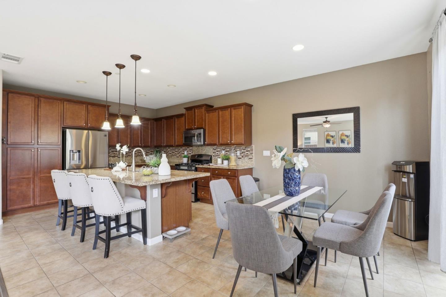 301 Promise Way Hollister, CA 95023 - Photo 5 of 22 a view of a dining room with furniture